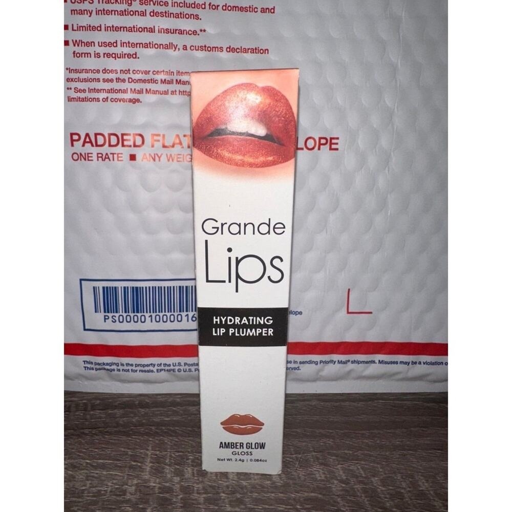 Grande lips amber glow lip plumping lip‎ gloss shine
